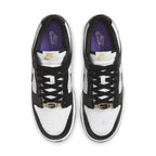 Nike Dunk Low World Champs in black and white with gold details and purple interior.