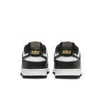 Nike Dunk Low World Champs Black White rear view with shiny overlays and gold accents on the laces.