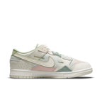 Nike Dunk Scrap Grey Haze Phantom sneaker featuring patchwork leather and pastel color accents.