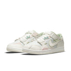 Nike Dunk Scrap Grey Haze Phantom sneakers in white, featuring pastel accents and mesh panels for breathability.