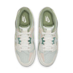 Nike Dunk Scrap Grey Haze Phantom shoes, featuring a patchwork design with pastel accents in green, blue, and pink.