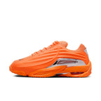 Nike Hot Step 2 Drake NOCTA sneaker in total orange with reflective finish and mini-Swoosh.