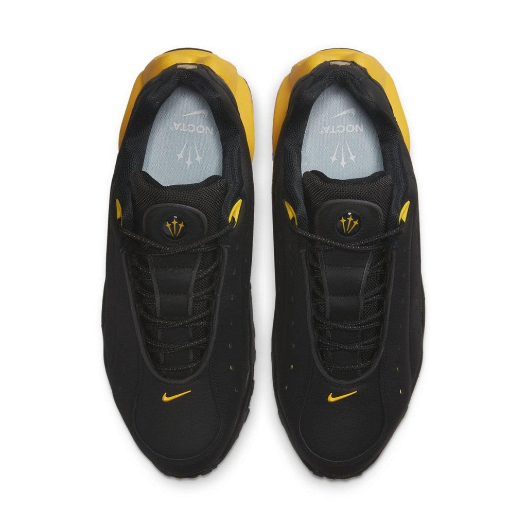 Nike Hot Step Air Terra Drake NOCTA in black and yellow, featuring sleek design and reflective details.