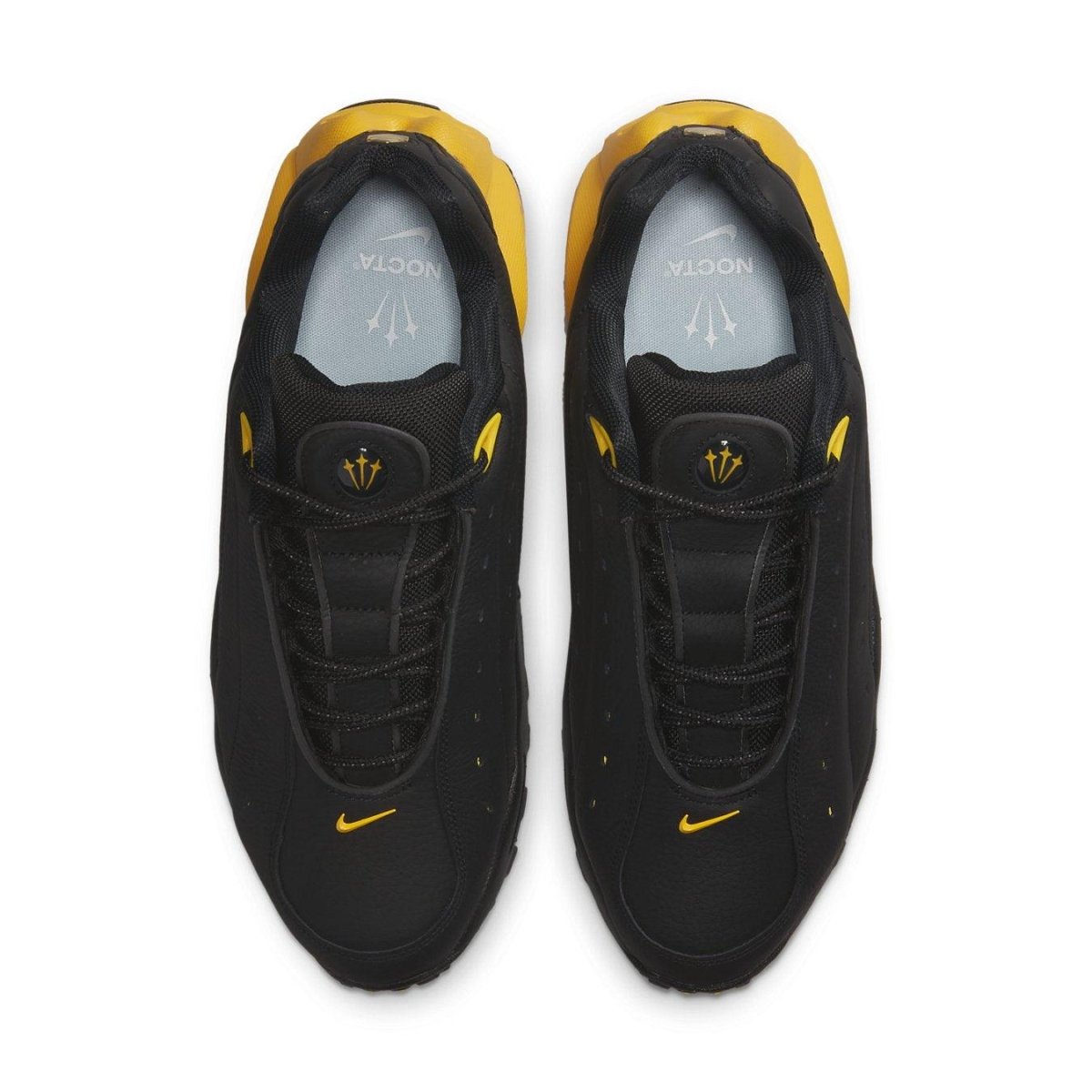Nike Hot Step Air Terra Drake NOCTA in black and yellow, featuring sleek design and reflective details.