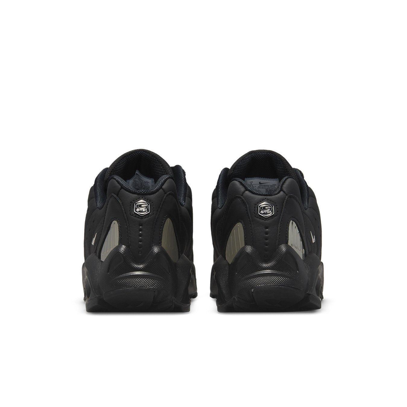 Nike Hot Step Air Terra Drake NOCTA Triple Black rear view, showcasing the sleek design and details.