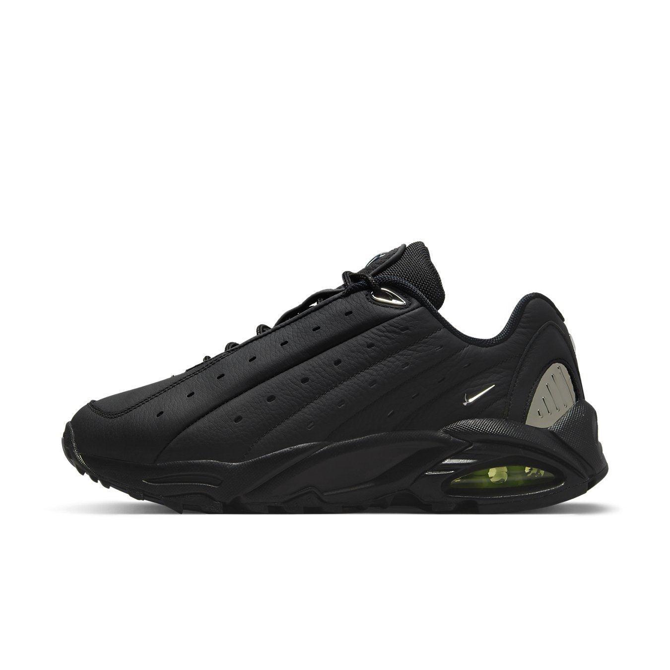 Nike Hot Step Air Terra Drake NOCTA in Triple Black featuring leather upper and sleek design.