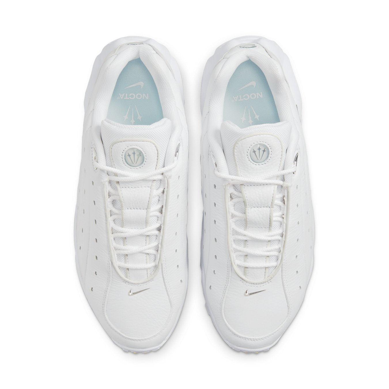 Nike Hot Step Air Terra Drake NOCTA White sneakers featuring a clean white leather upper and decorative side perforations.
