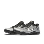 Nike Kobe 11 Quai 54 sneakers featuring a white mesh upper with black accents and Flywire lacing system.