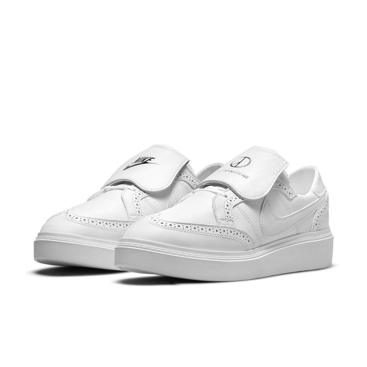 Nike Kwondo 1 G-Dragon Peaceminusone Triple White sneakers in all-white leather with unique design elements.