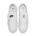 Nike Kwondo 1 G-Dragon Peaceminusone Triple White shoes with black branding on a white leather upper.