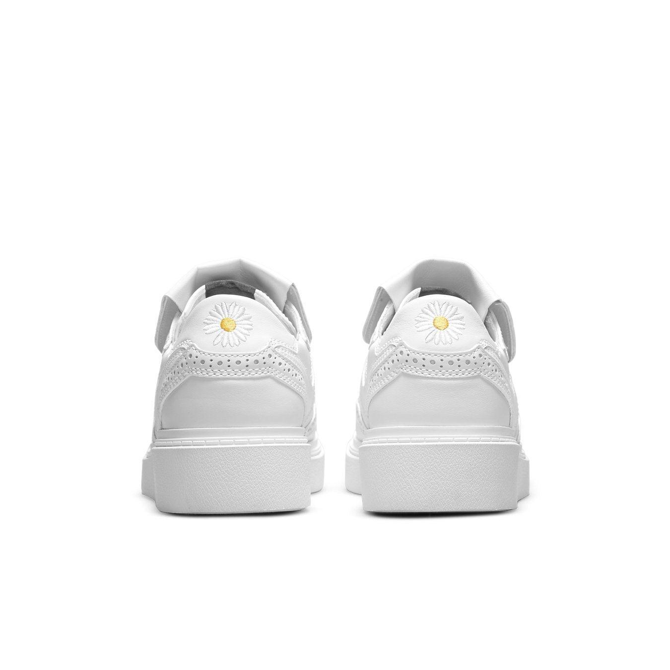 Nike Kwondo 1 G-Dragon Peaceminusone Triple White shoes, back view showing floral design in white leather.