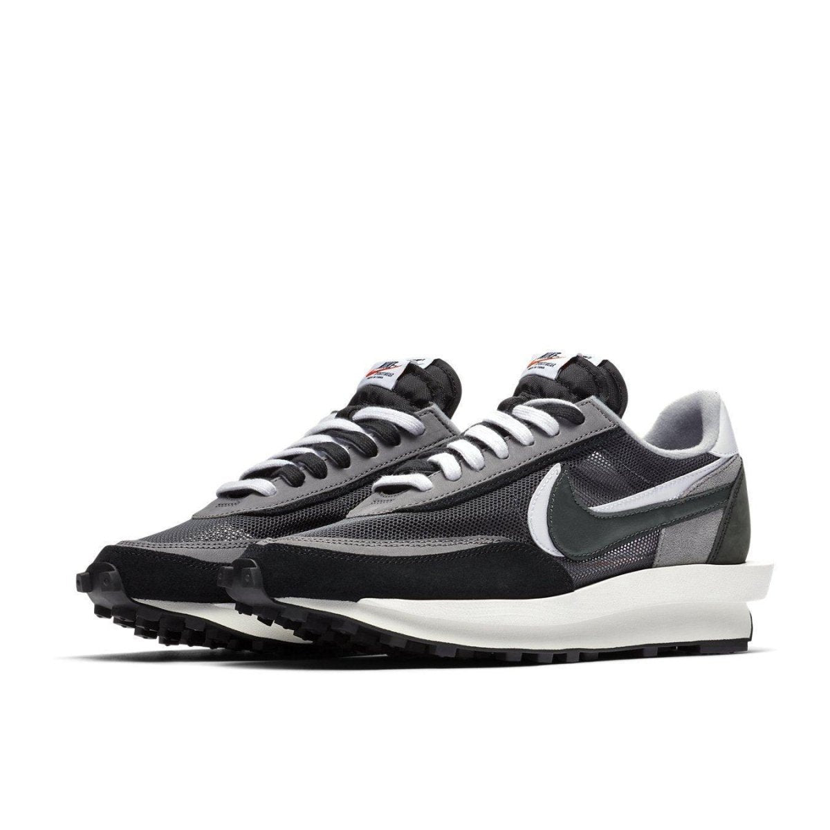 Nike LD Waffle Sacai Black sneakers featuring a hybrid design with double tongue and Swoosh detail.