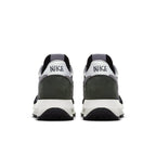 Rear view of Nike LD Waffle Sacai Black sneakers featuring co-branded Nike x Sacai logo and unique design elements.