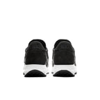 Nike LD Waffle Sacai Black Nylon sneakers rear view with dual branding and sleek black suede design.