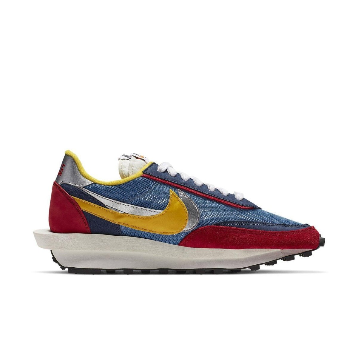 Nike LD Waffle Sacai in blue, red, and yellow, featuring a unique double Swoosh design and hybrid style.
