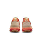 Nike LD Waffle sacai CLOT shoes rear view featuring translucent upper and vibrant orange accents.