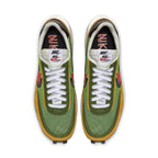 Nike LD Waffle Sacai sneakers in green and yellow mesh with double Swoosh and laces, showcasing unique design.