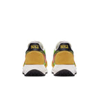 Rear view of Nike LD Waffle Sacai shoes in green and yellow with double Swoosh design.