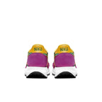 Nike LD Waffle Sacai Pine Green sneakers rear view in vibrant purple and yellow with co-branded emblem.