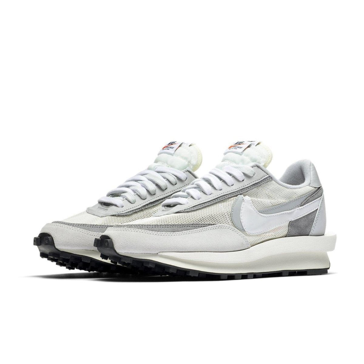 Nike LD Waffle Sacai Summit White sneakers featuring dual-layer design and co-branded details.