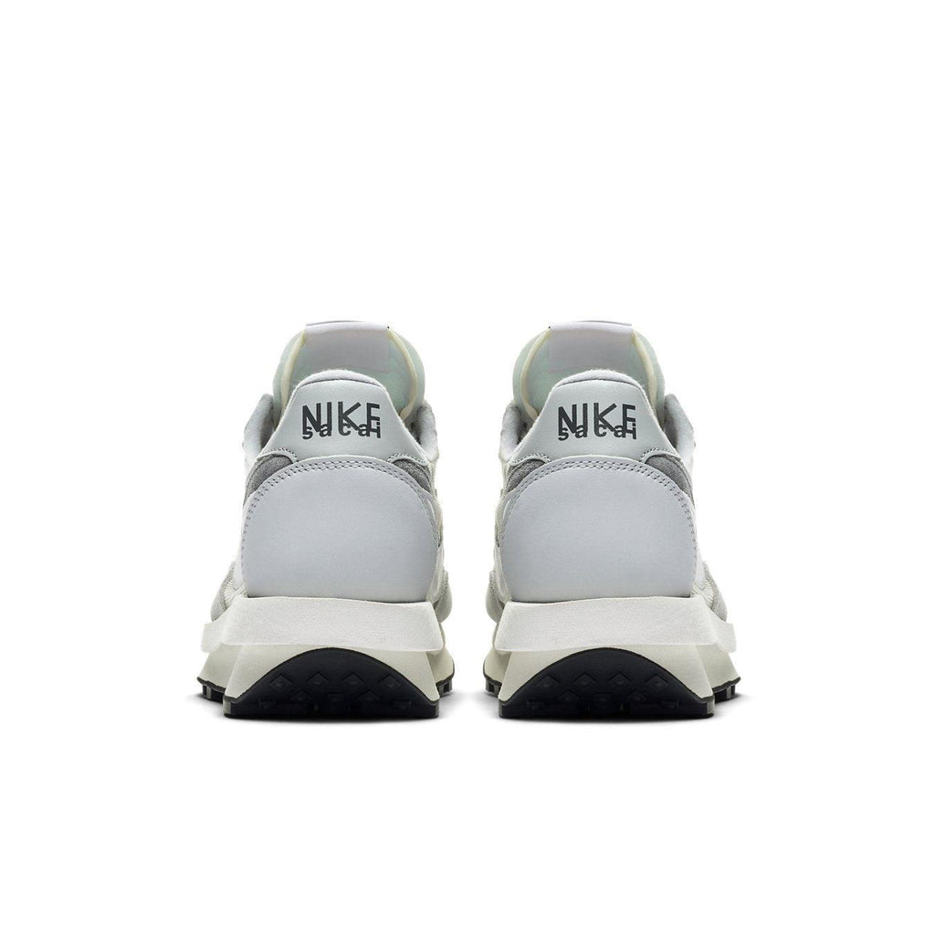 Nike LD Waffle Sacai Summit White sneakers rear view with co-branded Nike and Sacai logo.