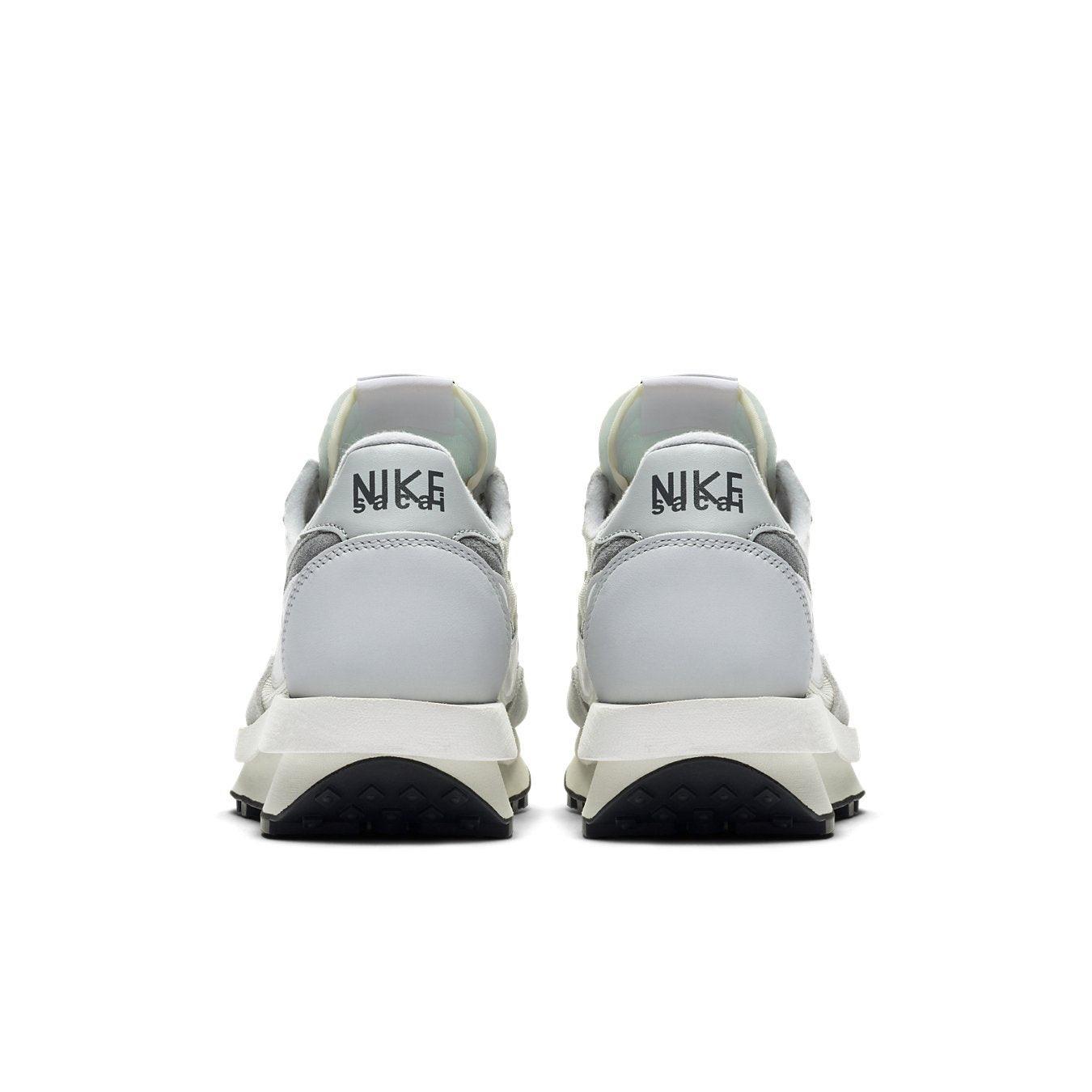Nike LD Waffle Sacai Summit White sneakers rear view with co-branded Nike and Sacai logo.