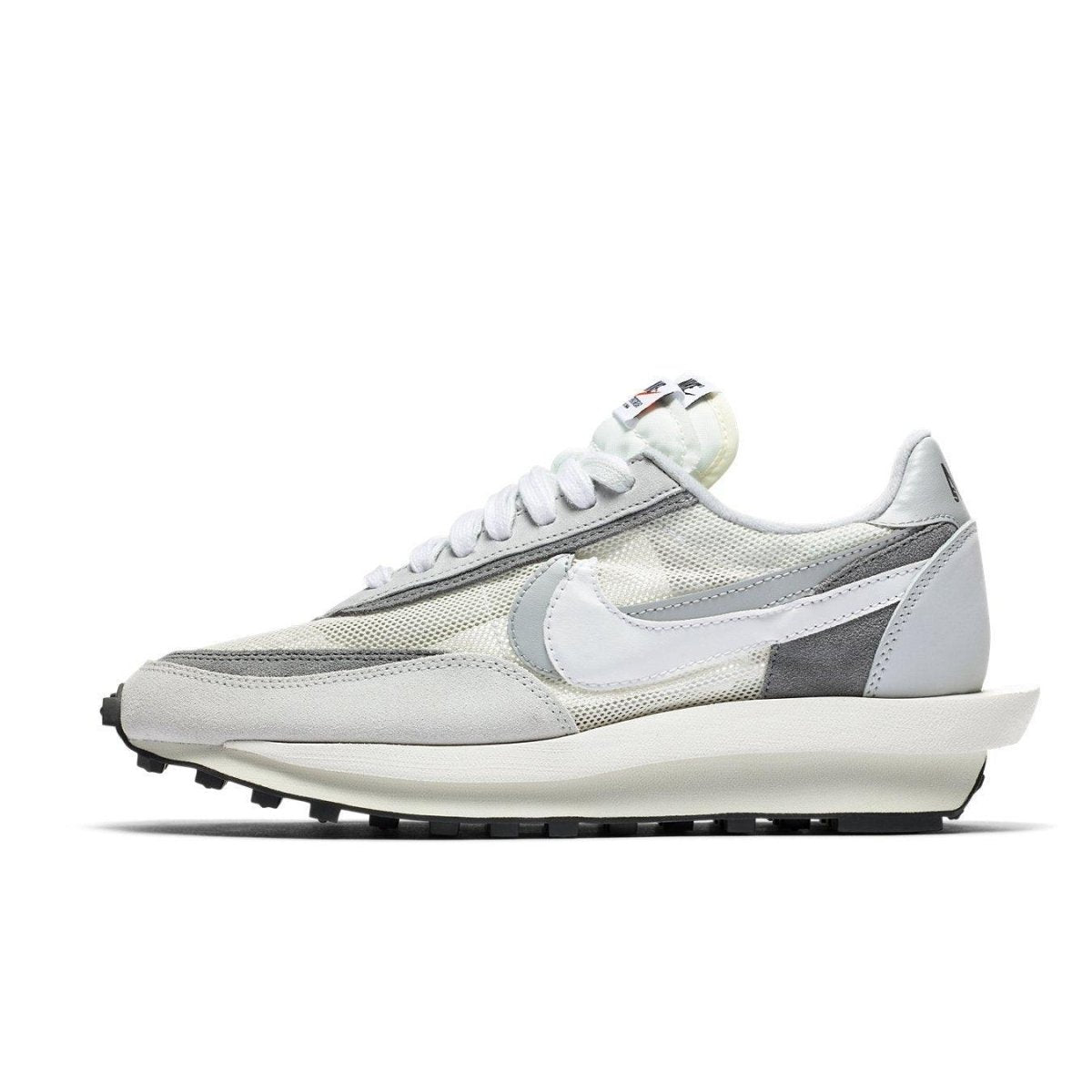 Nike LD Waffle Sacai Summit White sneaker, a hybrid design featuring double tongues and co-branded details.