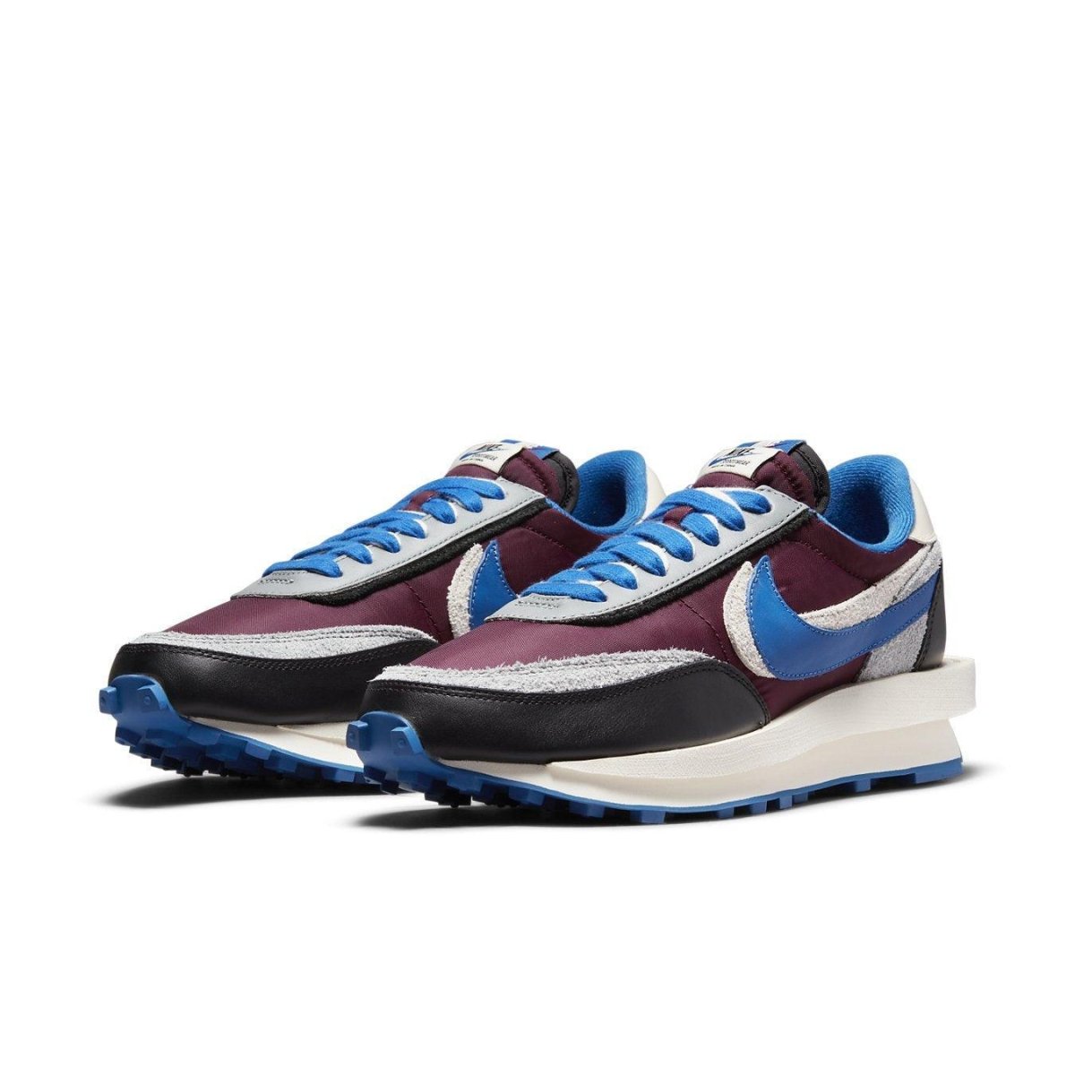 Nike LD Waffle sacai Undercover Night Maroon Team Royal sneakers in maroon, blue, and suede details.