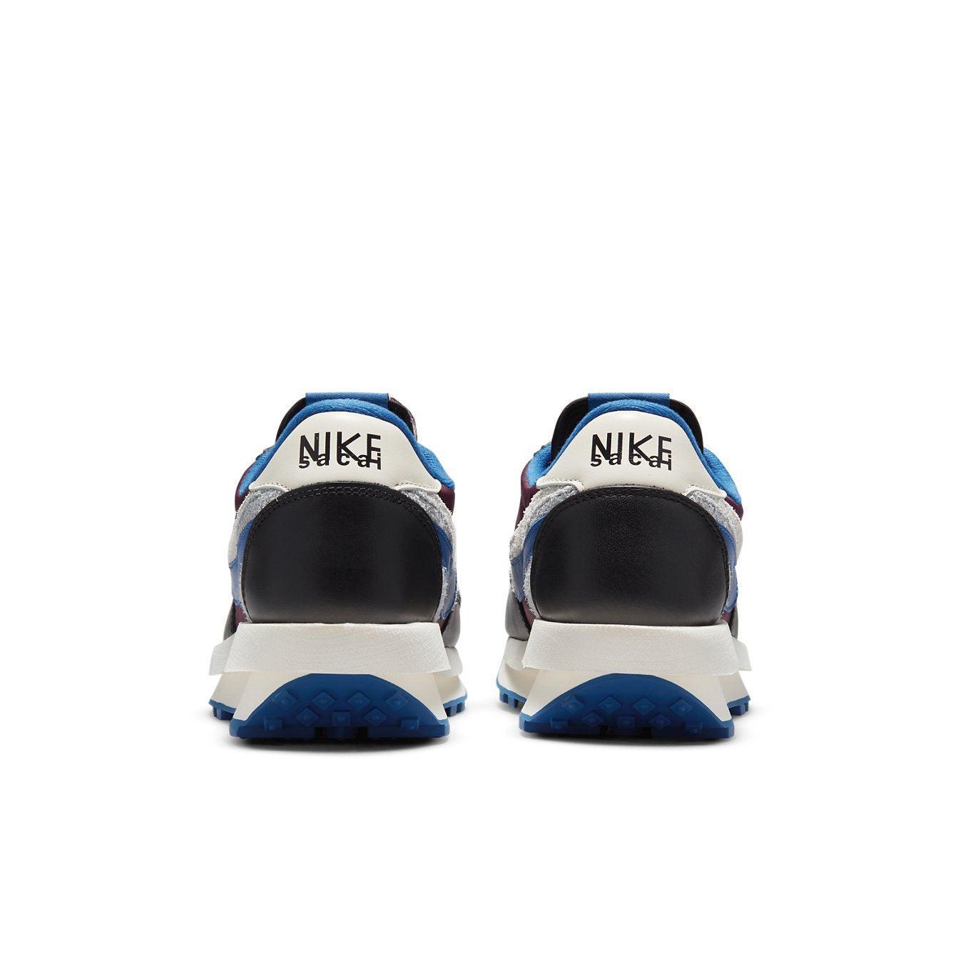 Rear view of Nike LD Waffle sacai Undercover sneakers in Night Maroon and Team Royal colors.
