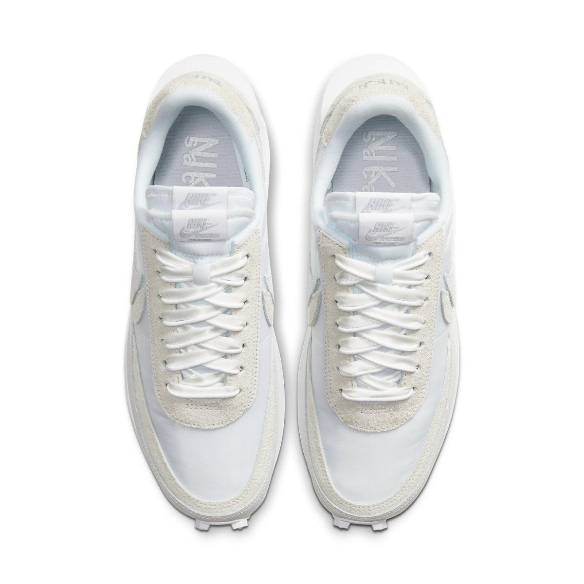 Nike LD Waffle Sacai in White Nylon, featuring dual tongues, laces, and co-branded Nike x Sacai emblem.