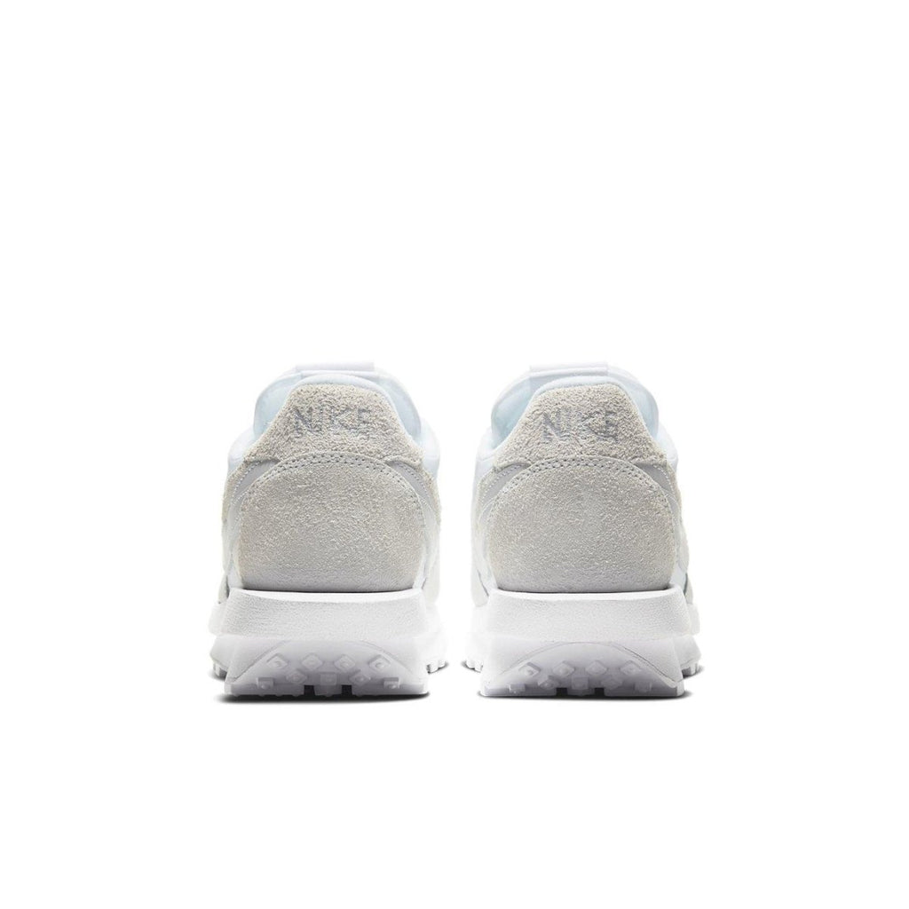 Rear view of Nike LD Waffle Sacai sneakers in white nylon with suede accents and co-branded detailing.