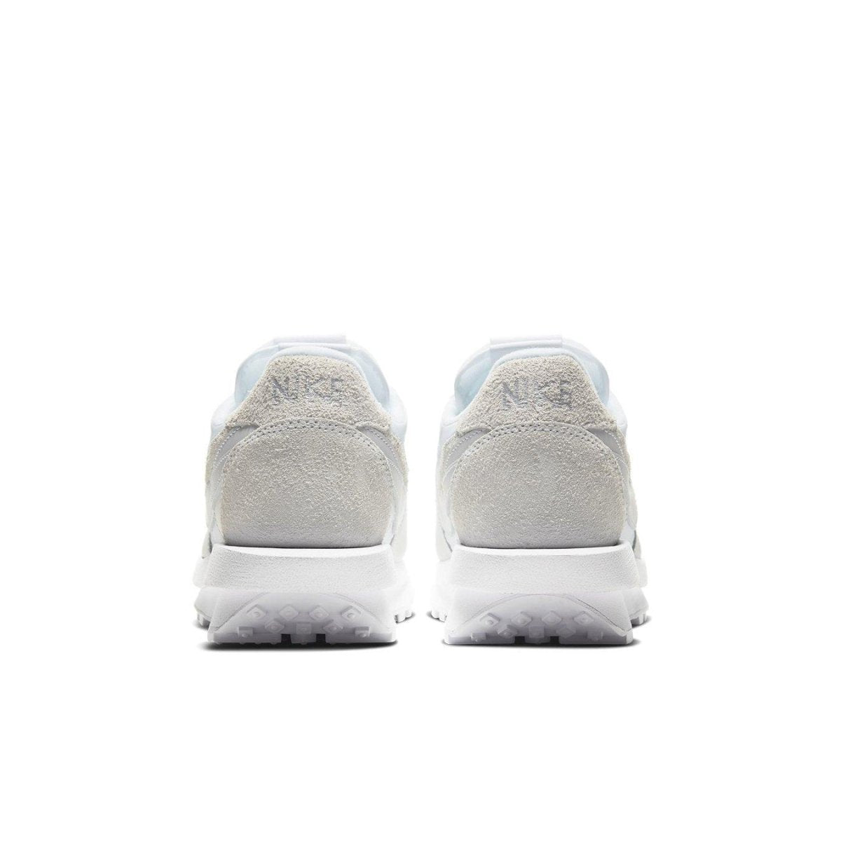 Rear view of Nike LD Waffle Sacai sneakers in white nylon with suede accents and co-branded detailing.