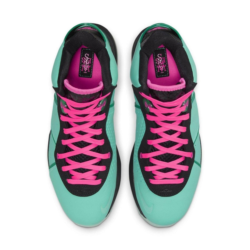 Nike LeBron 8 South Beach 2021 in teal and pink, showcasing stylish mid-top design and vibrant colors.