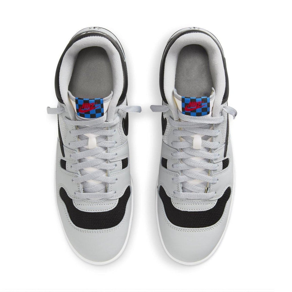 Nike Mac Attack SP Travis Scott Cactus Jack sneakers in grey and black with unique checkered logo.