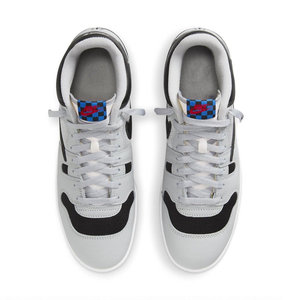 Nike Mac Attack SP Travis Scott Cactus Jack sneakers in grey and black with unique checkered logo.