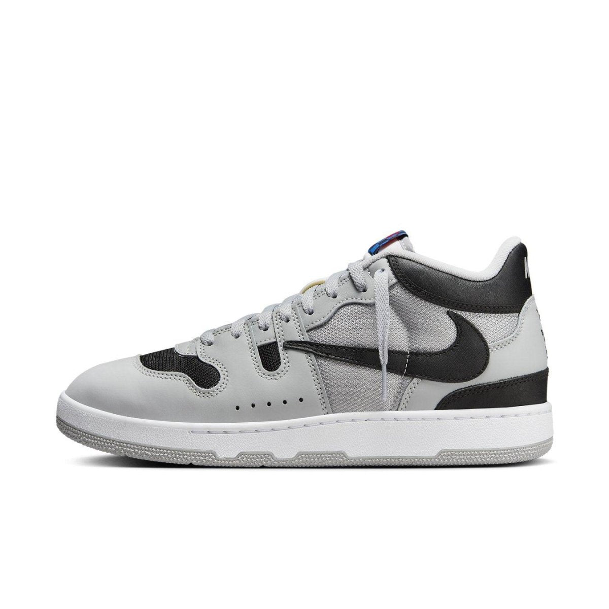 Nike Mac Attack QS SP Travis Scott Cactus Jack sneaker in grey and black, featuring retro tennis design.