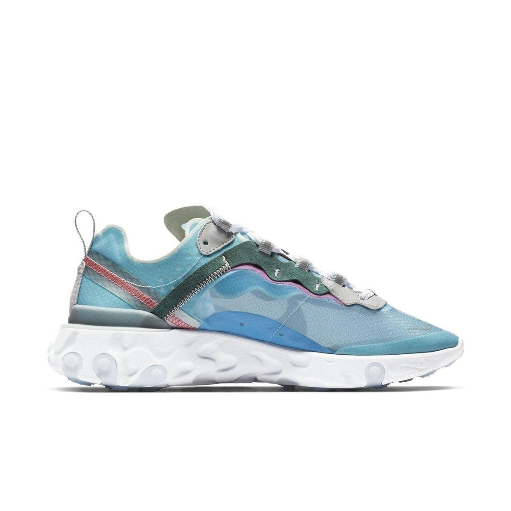Nike React Element 87 in Royal Tint with transparent upper, blue tones, pink stitching, and green accents.