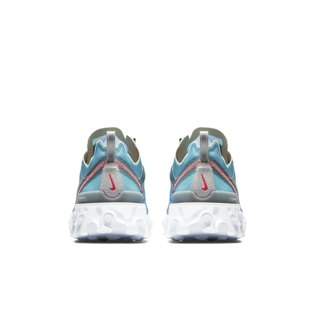 Nike React Element 87 Royal Tint sneakers, showcasing vibrant blue color, pink stitching, and suede eyelets.