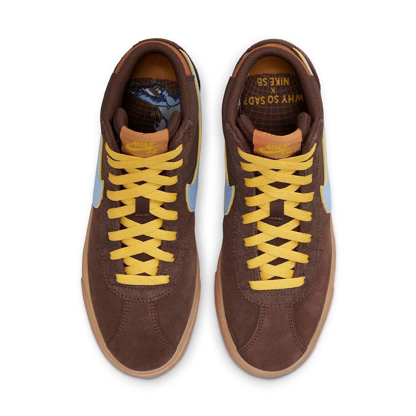 Nike SB Bruin High Why So Sad? women's sneaker in brown suede with light blue and yellow details, top view.