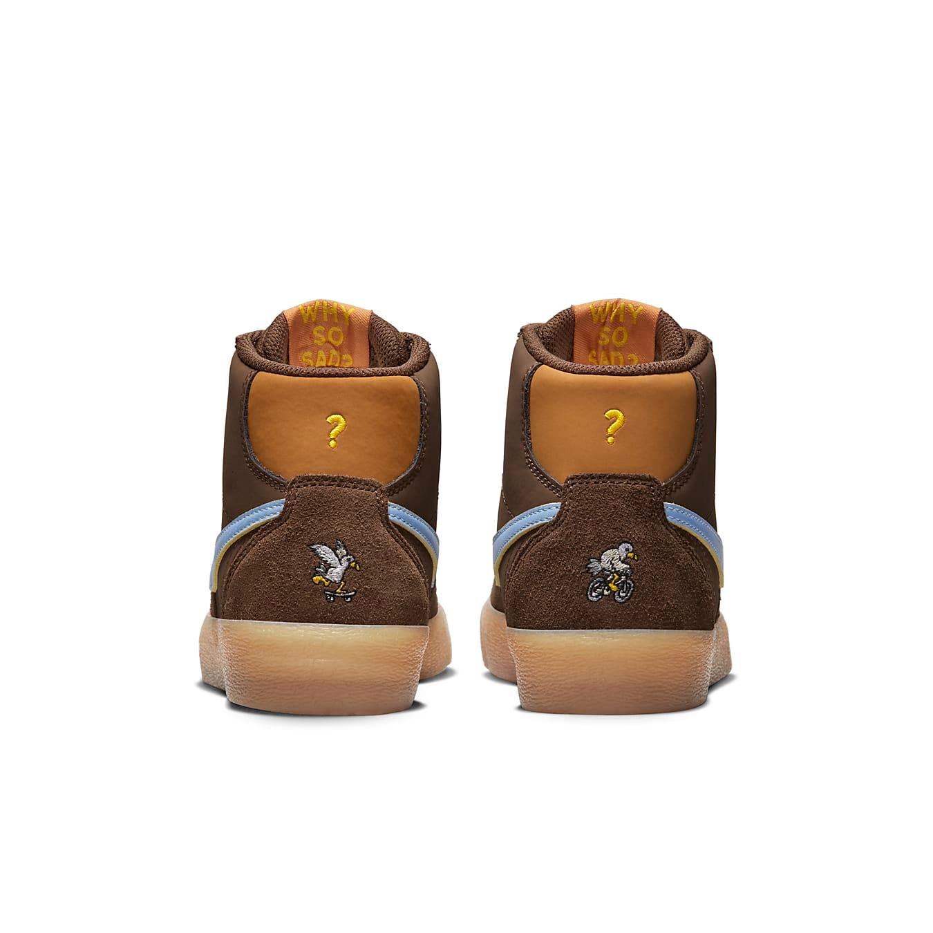 Nike SB Bruin High Why So Sad? women's shoes featuring brown suede, color-changing Swoosh, and playful back design.