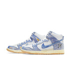 Nike SB Dunk High Carpet Company featuring white leather and unique blue patterns, designed for skateboard enthusiasts.
