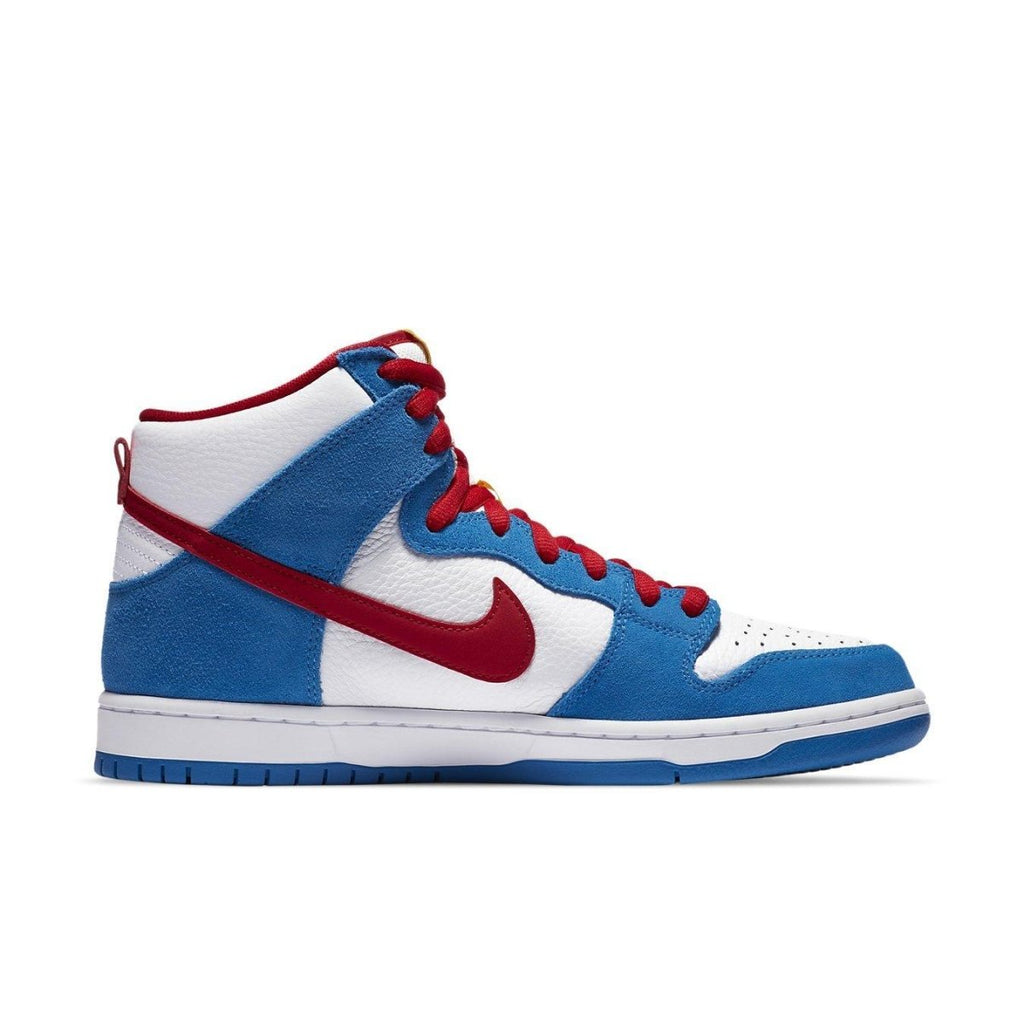 Nike SB Dunk High Doraemon sneaker in white, blue, and red with suede overlays and bold swoosh design.
