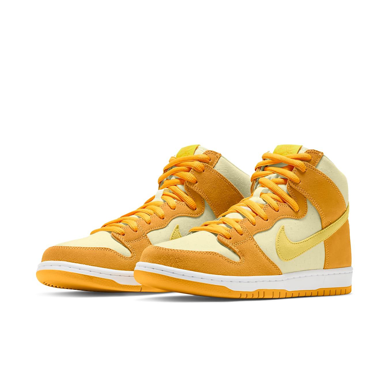 Nike SB Dunk High Pineapple sneakers with yellow leather and suede overlay, featuring playful cartoon pineapple label.