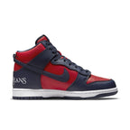 Nike SB Dunk High Supreme By Any Means Navy sneaker in red and navy colorway, showcasing varsity-inspired design.