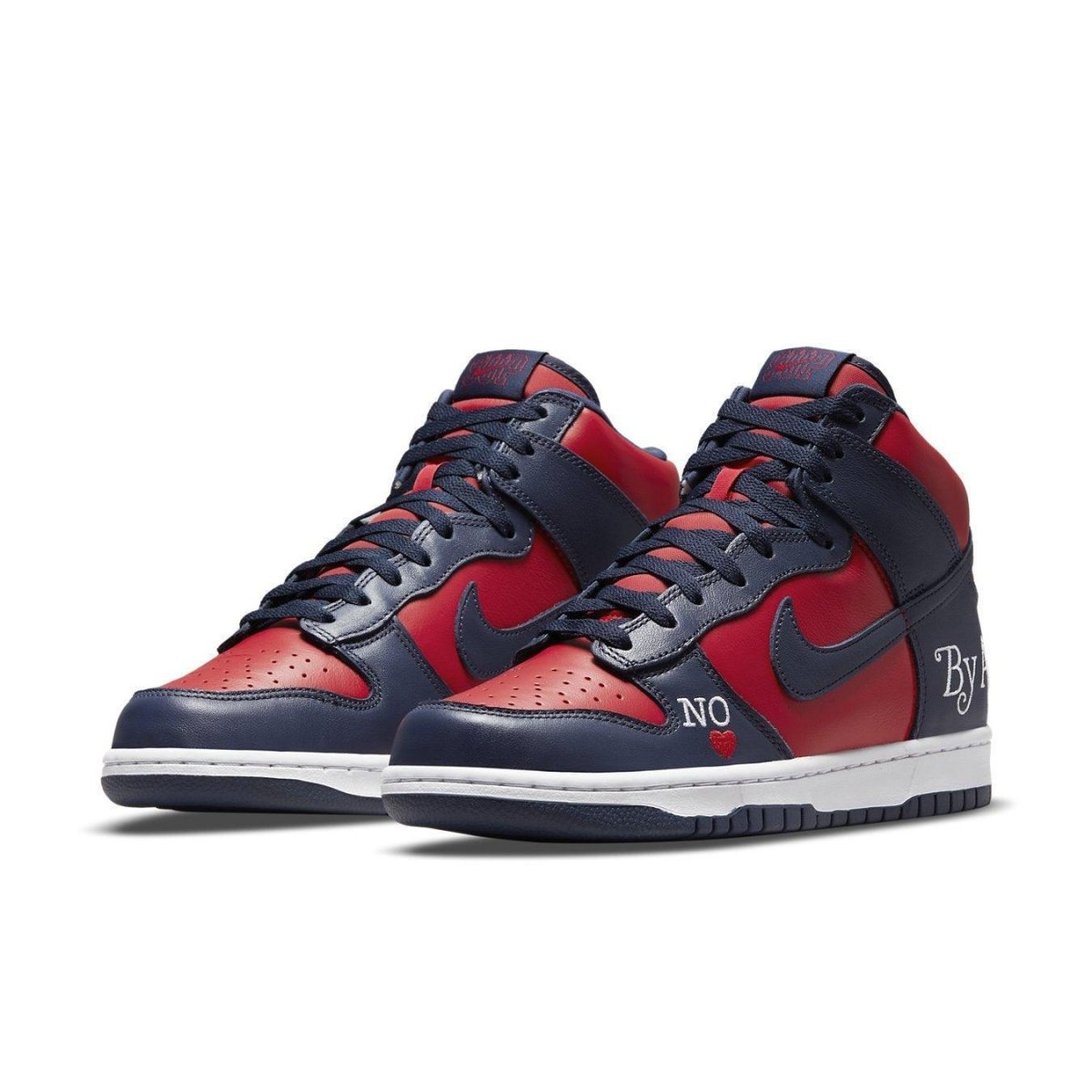 Nike SB Dunk High Supreme "By Any Means" in red and navy colorway, featuring leather upper and distinct branding.