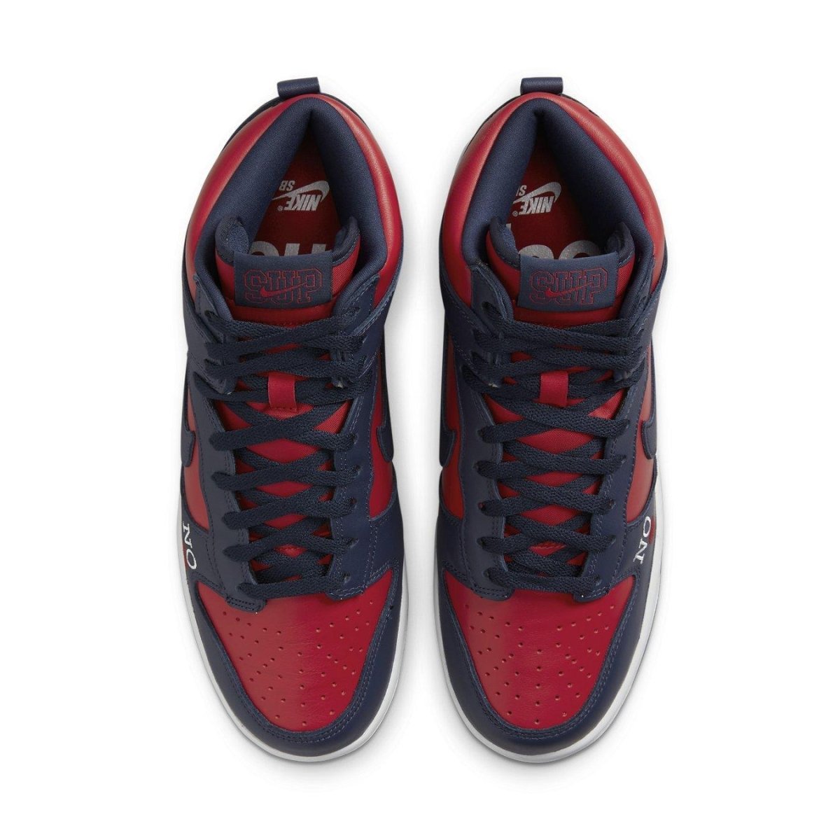 Nike SB Dunk High Supreme By Any Means in Red and Navy colorway, featuring leather upper and lace-up design.