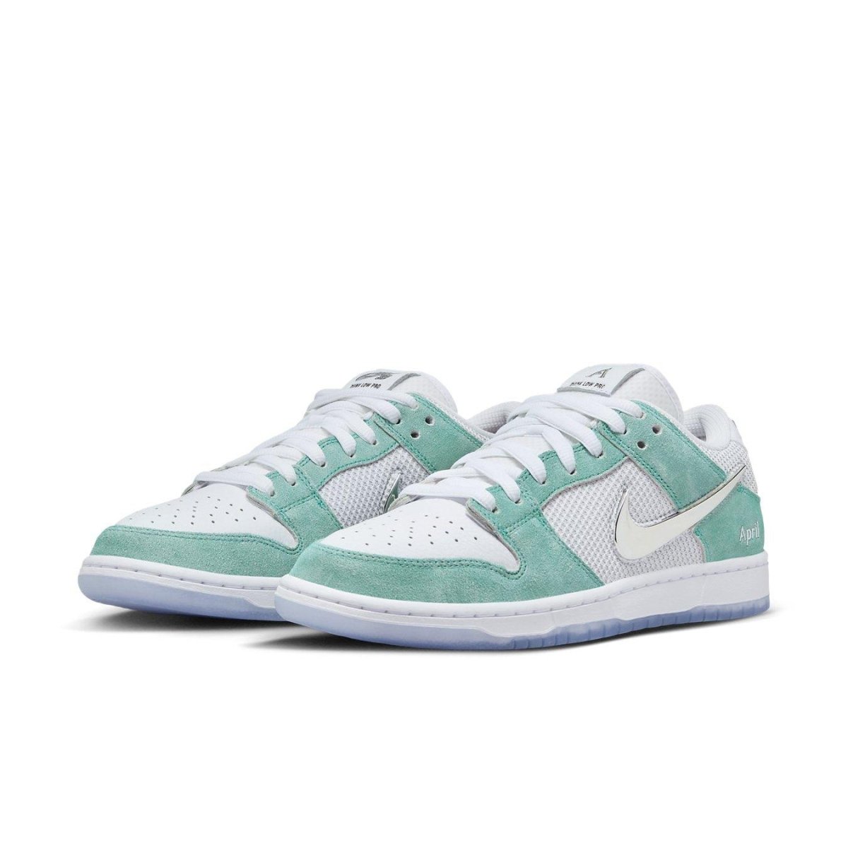 Nike SB Dunk Low April Skateboards in Turbo Green, featuring white mesh and chrome Swoosh accents.