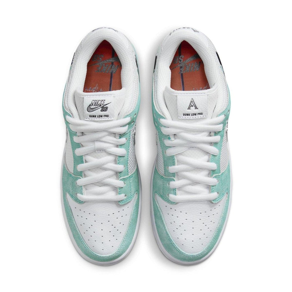 Nike SB Dunk Low April Skateboards in Turbo Green with white mesh and suede overlays from above view.