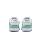 Retro view of Nike SB Dunk Low April Skateboards sneakers featuring 'April' and 'Nike' branding.