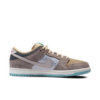 Nike SB Dunk Low Big Money Savings featuring beige canvas, silver brocade, and turquoise accents.